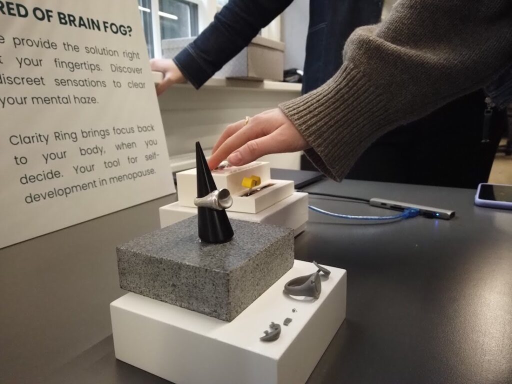 The team behind the Clarity Ring made these prototypes in rubber and silver, respectively. The prototypes were showcased at the 2024 KEA Meaningful Menopause Jewellery exhibition.